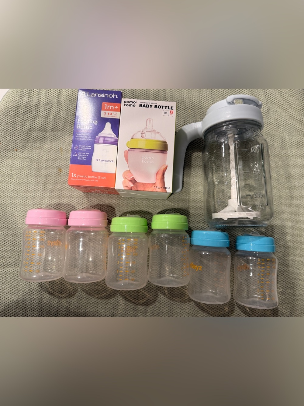 Bundle pitcher with baby bottles